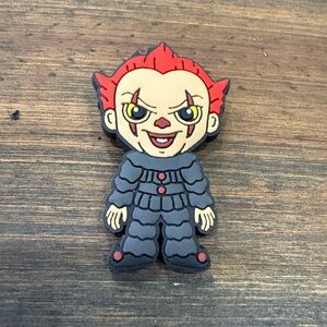 Red and Gray Clown Figure Toy